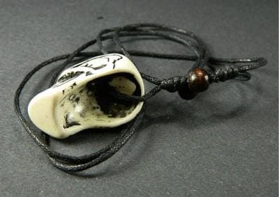 Tribal Yak Bone Skull Pendant: Black and White Resin Charm - Thumbnail 2