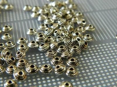Silver Tibetan Spacer Beads: Flat Donut Design (5mm Diameter) 50 beads - Thumbnail 4