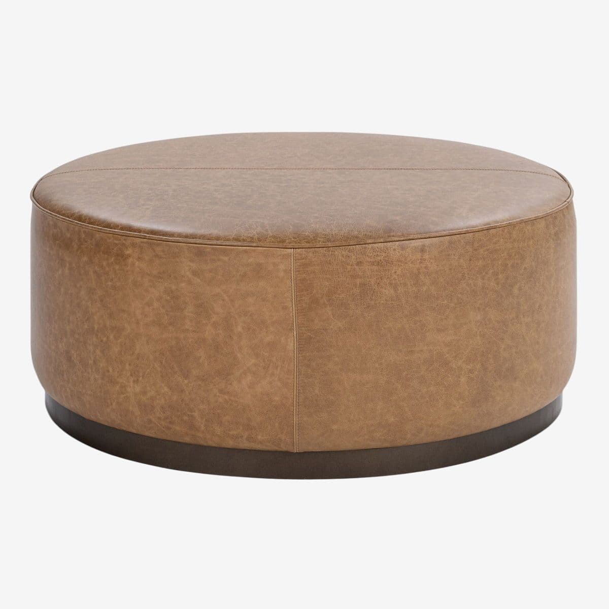 Aged Caramel Leather Round Ottoman - Image 1