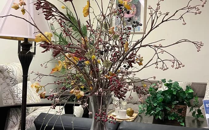 Cut glass floor vase with arrangement, as photographed