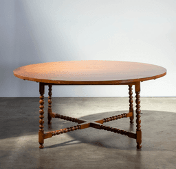 Traditional Round Wood Dining Table with Turned Legs and Cross Stretcher