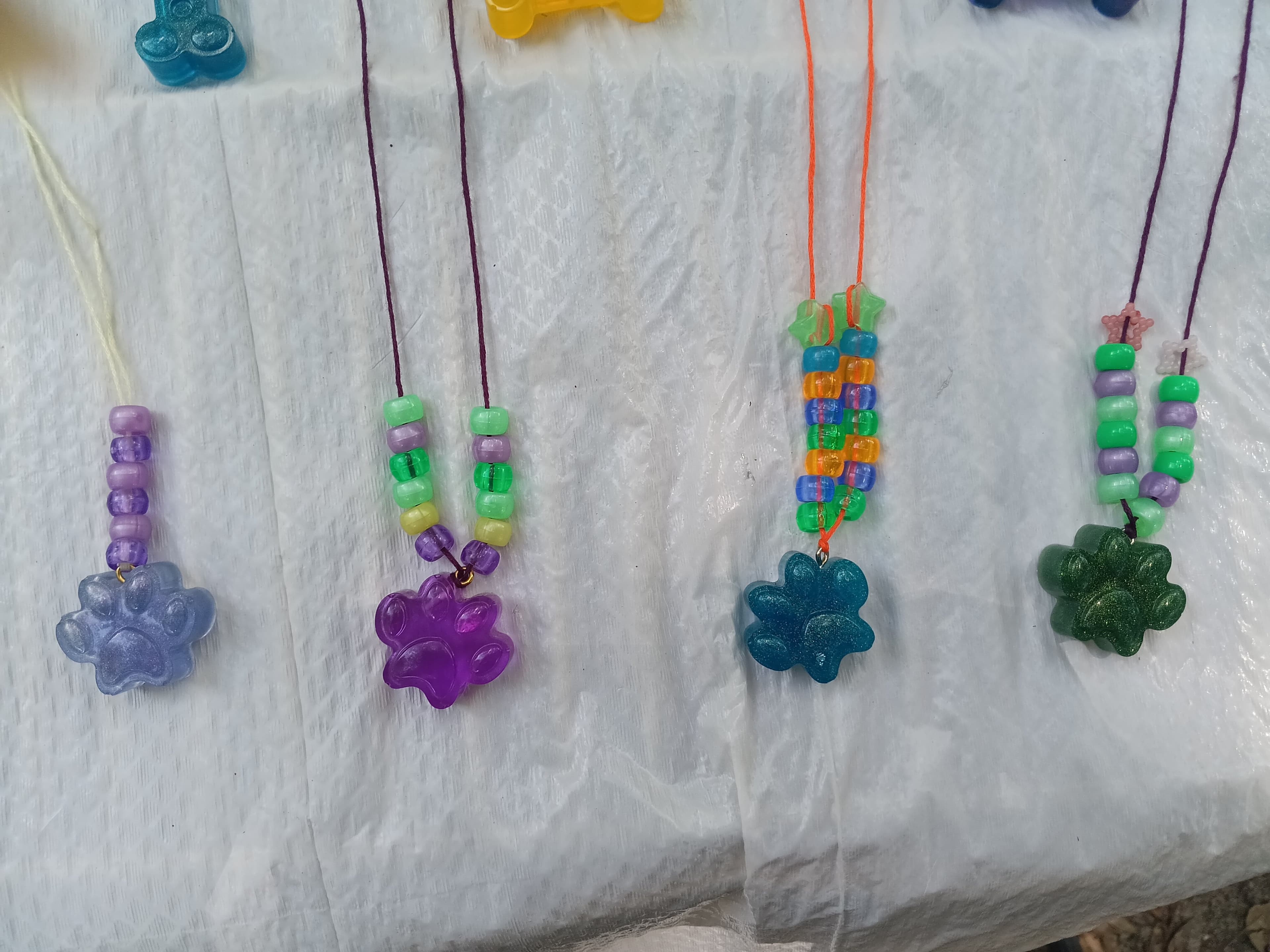 Handmade resin paw print necklace