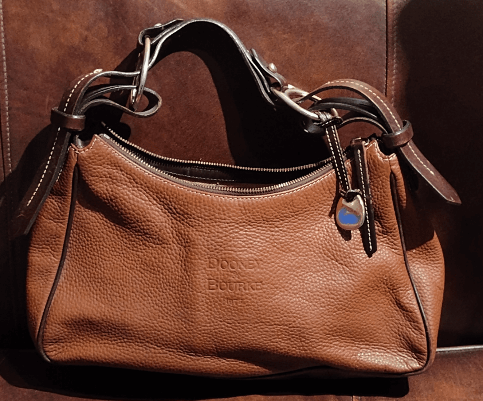 Dooney & Bourke Brown Leather Boho Baguette Shoulder Bag Embossed Logo - Image 1