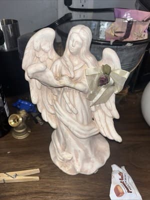 Porcelain Ivory Angel Holding Scroll, Stands 9 inches Tall - Image 1