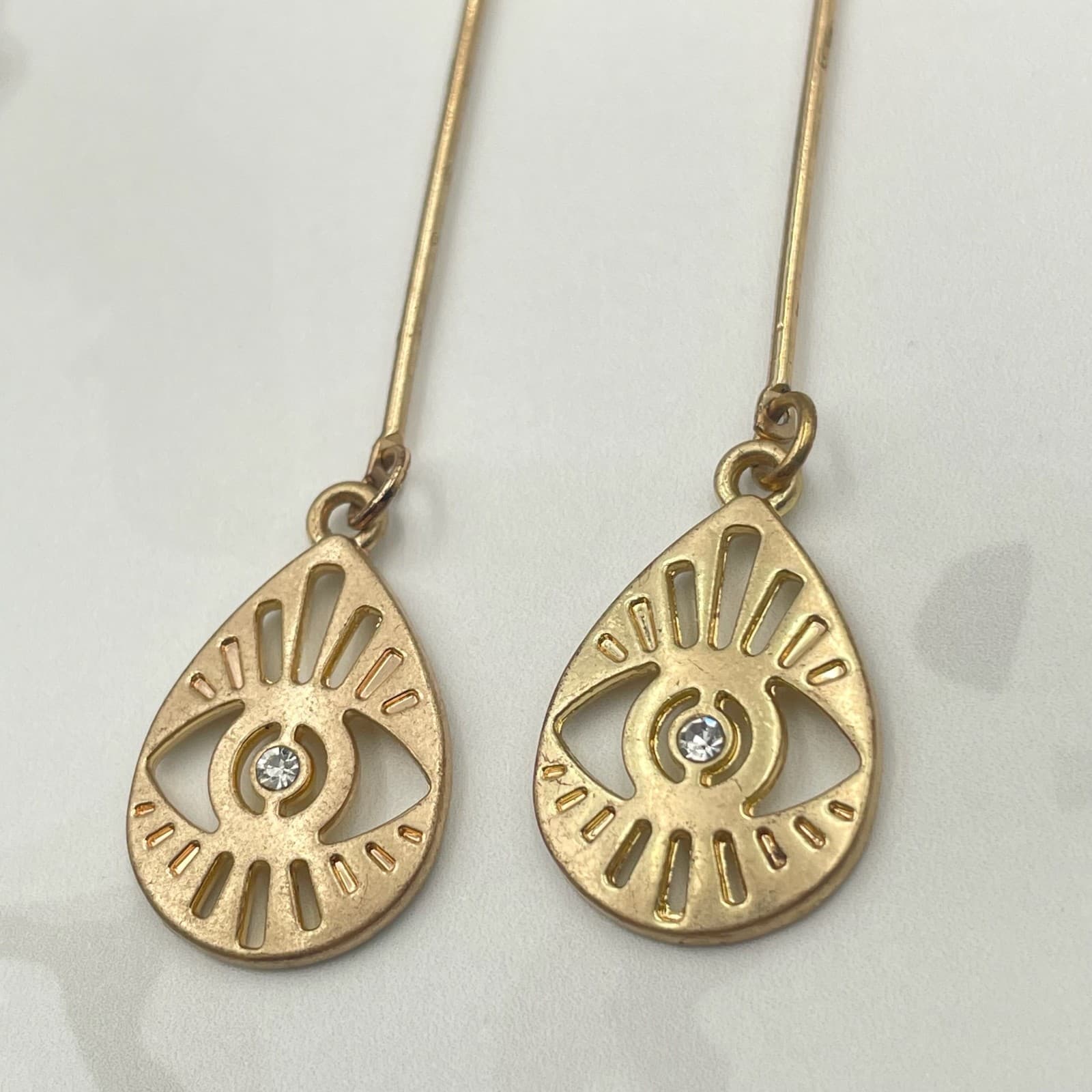 Vintage VTG Gold Tone Dangle Earrings Clear Stone Evil Eye Teardrop Stud Modern - Image 1