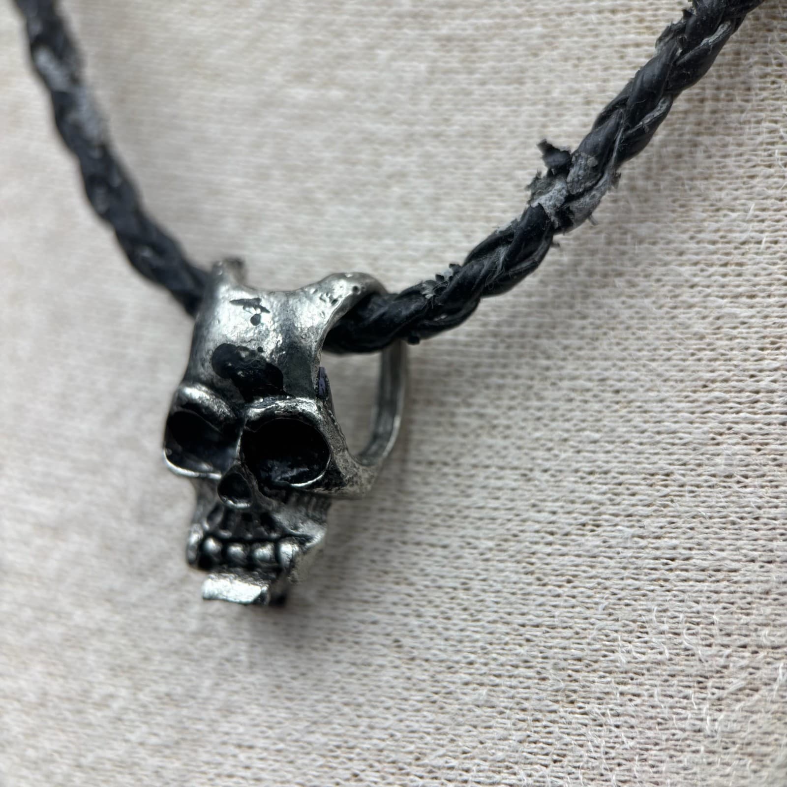 Vintage Silver-Tone Black Human Skull Retro Classic Braided Cord Charm Pendant - Image 1