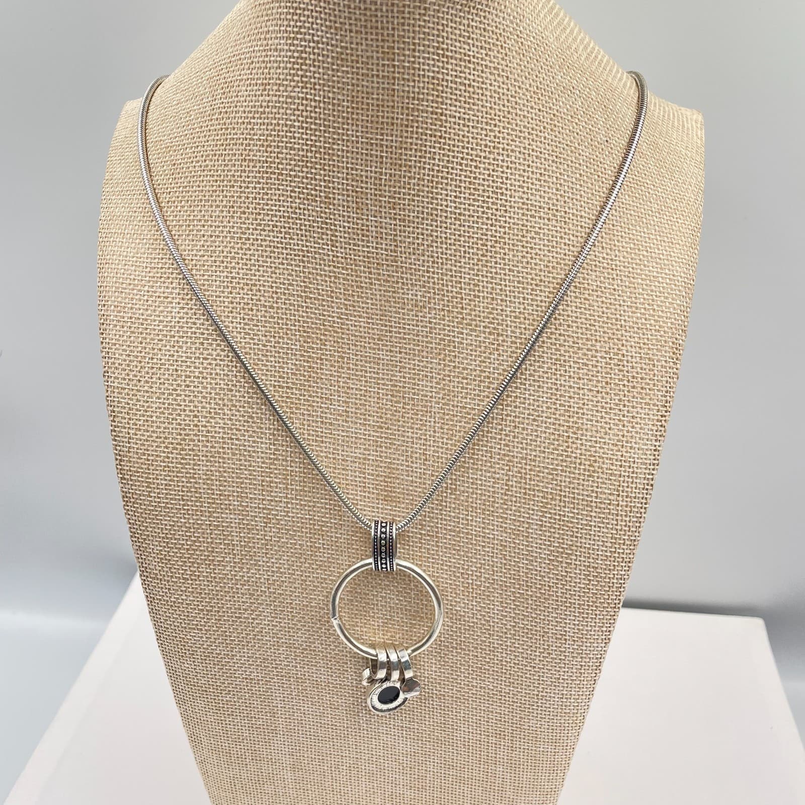 Vintage Silver Tone Geometric Ring Pendant Necklace Black Stone Snake Long Chain - Image 1