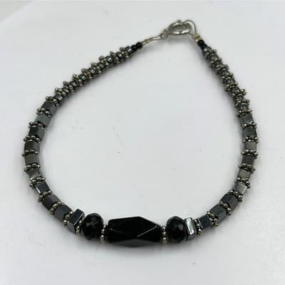 Vintage Black Beaded Bracelet Hematite Tone Spacer Faceted Center Minimalist - Image 1