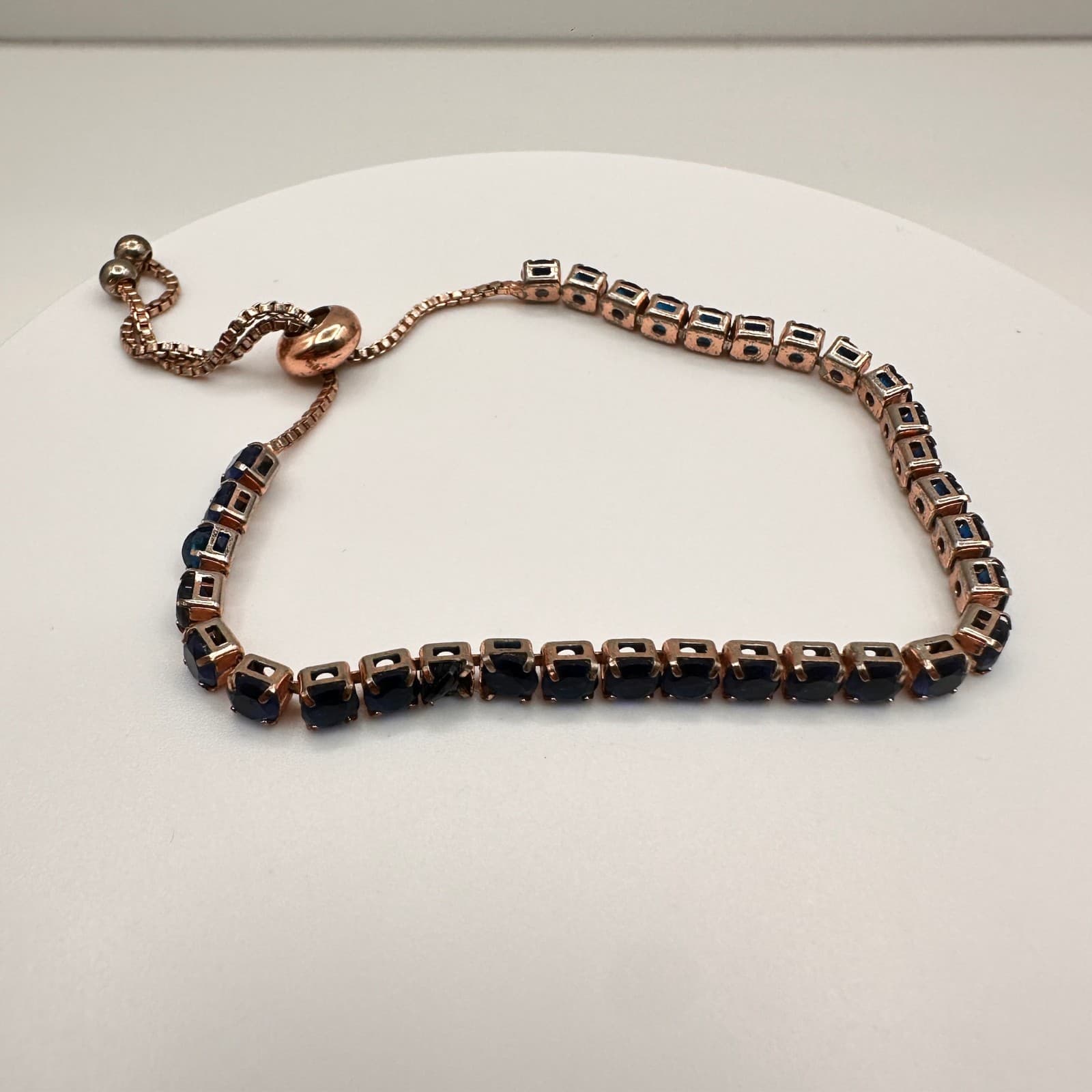 Vintage 90s Y2K Rose Gold Tone Blue Sapphire CZ Bolo Tennis Bracelet Adjustable - Image 1