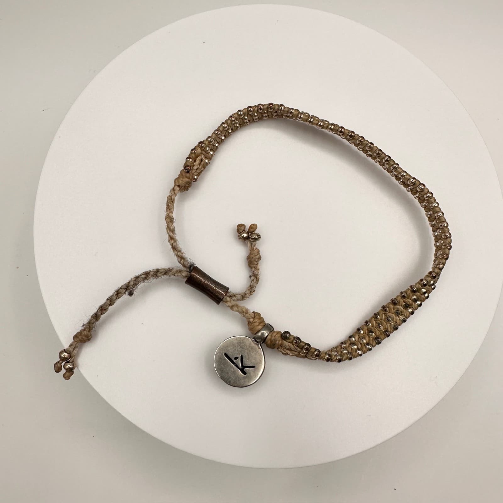 Vintage 90s Beaded Braided War Kiss Bracelets Silver Tone Charm Adjustable - Image 1