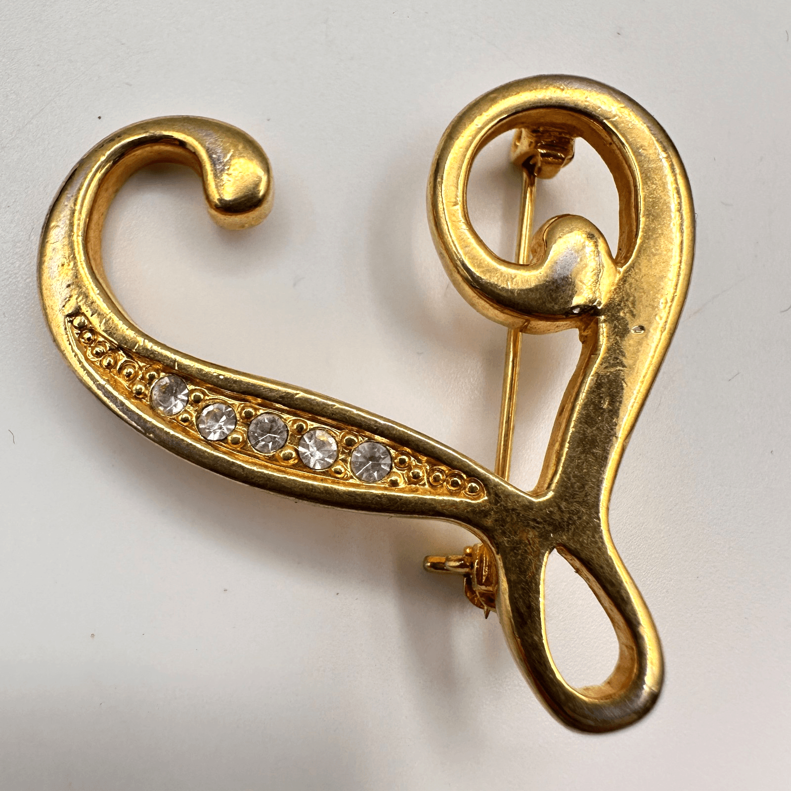 Vintage 80s Gold Tone Swirl Heart Brooch Pin Clear Rhinestone Statement Jewelry - Image 1