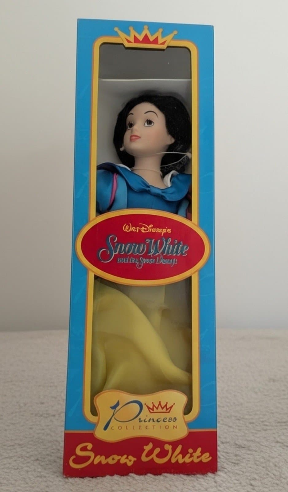 Disney Princess Snow White Porcelain Doll in A Blue and Yellow Silky Dress - Image 1