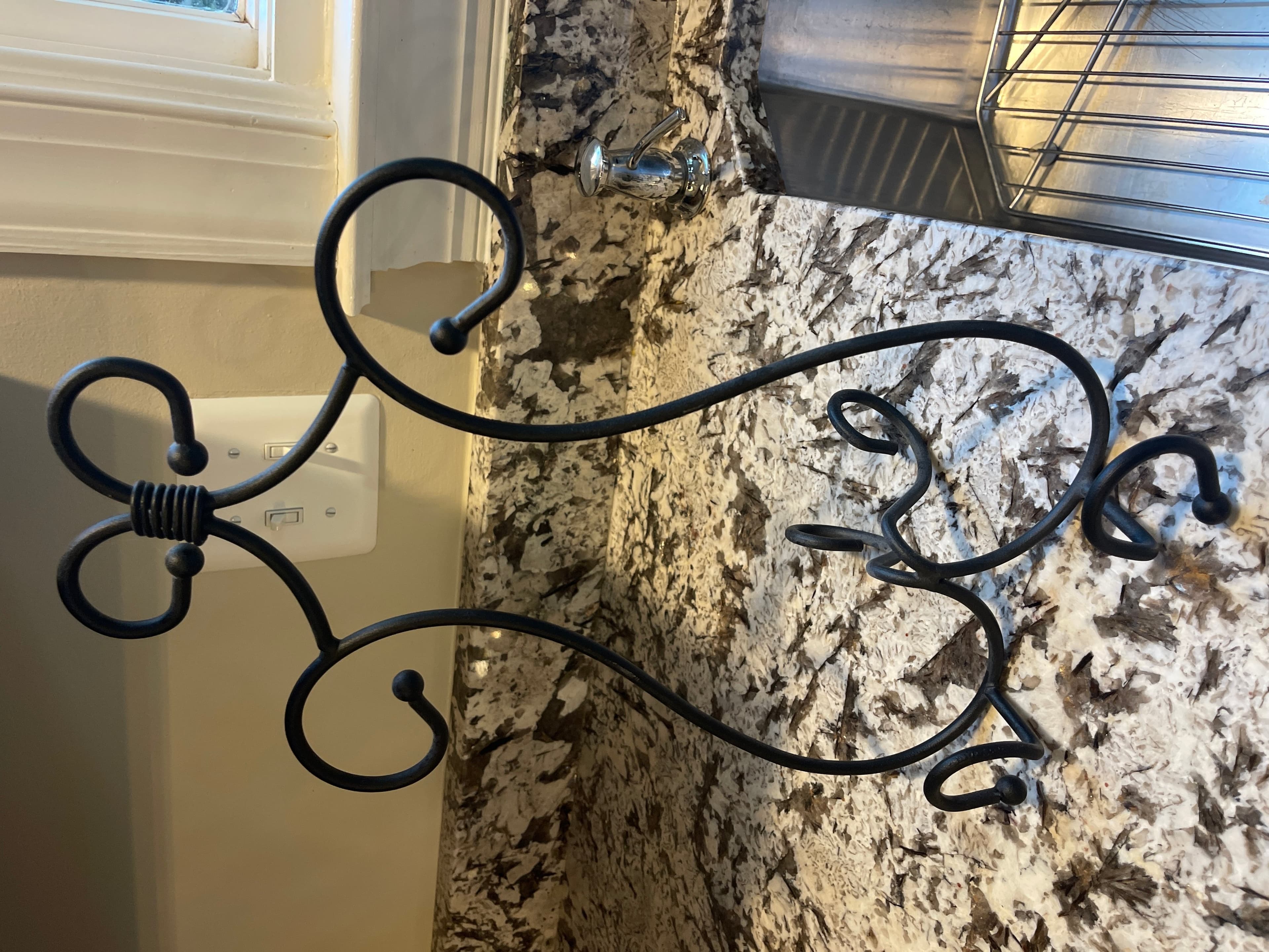 Wrought Iron Decorative Stand with Curved Design - Image 1