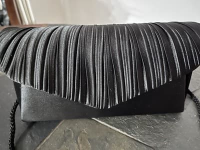 Modern, Sleek designer Clutch by Jessica McClintock. Snag It Fast, It Won’t Last - Image 1