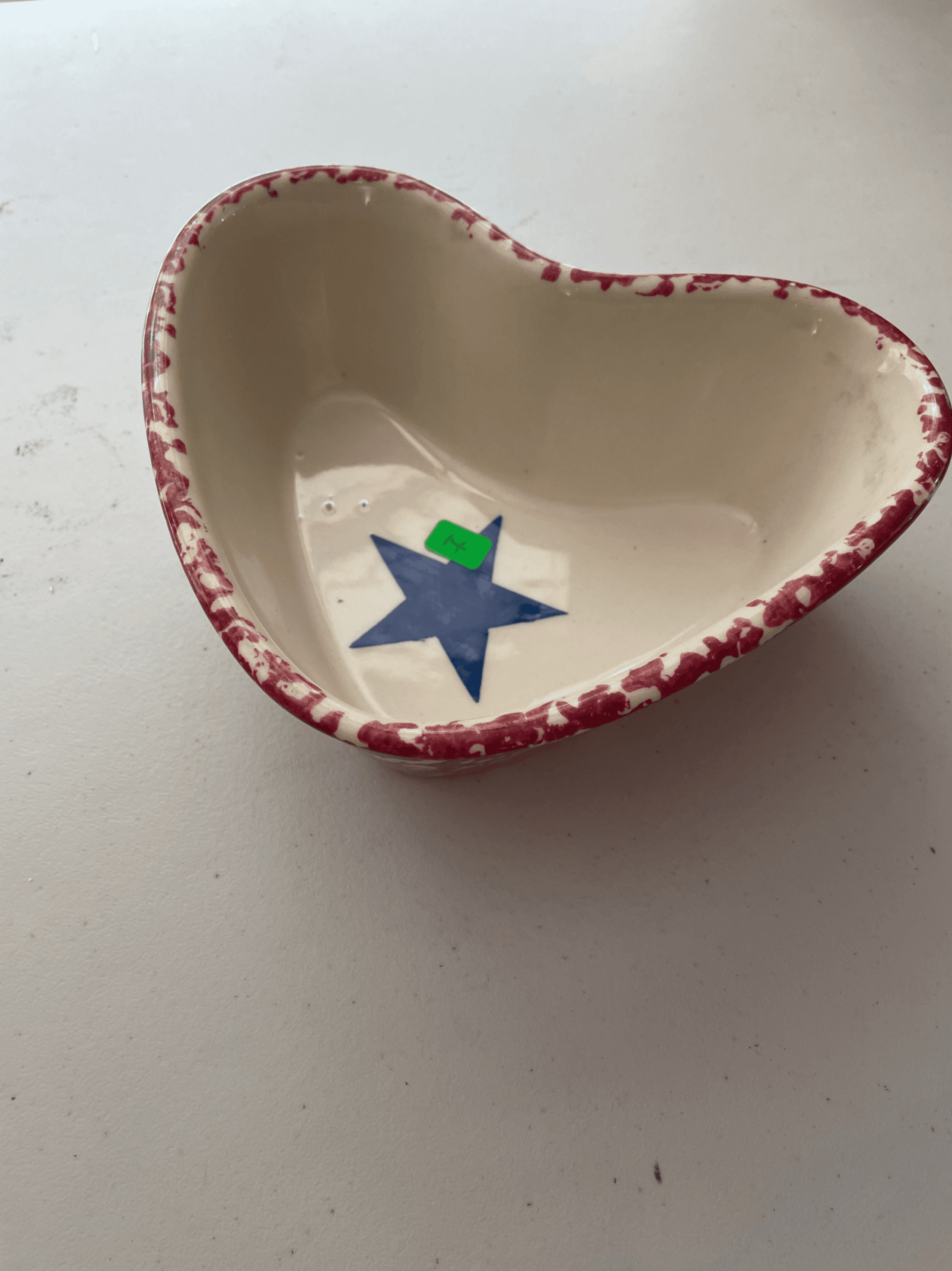 Heart-Shaped Ceramic Bowl with Red Trim and Blue Star