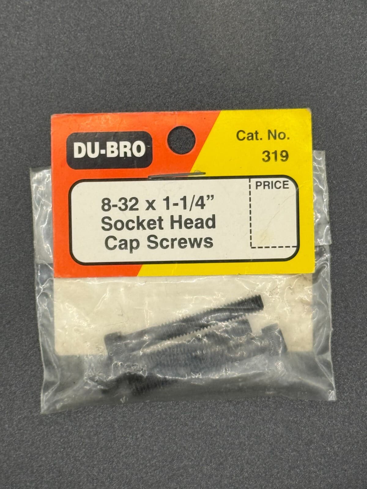 Du-Bro Catalogue Part # 319 8-32 x 1-1/4" Socket Head Cap Screws (Set of 4) - Image 1