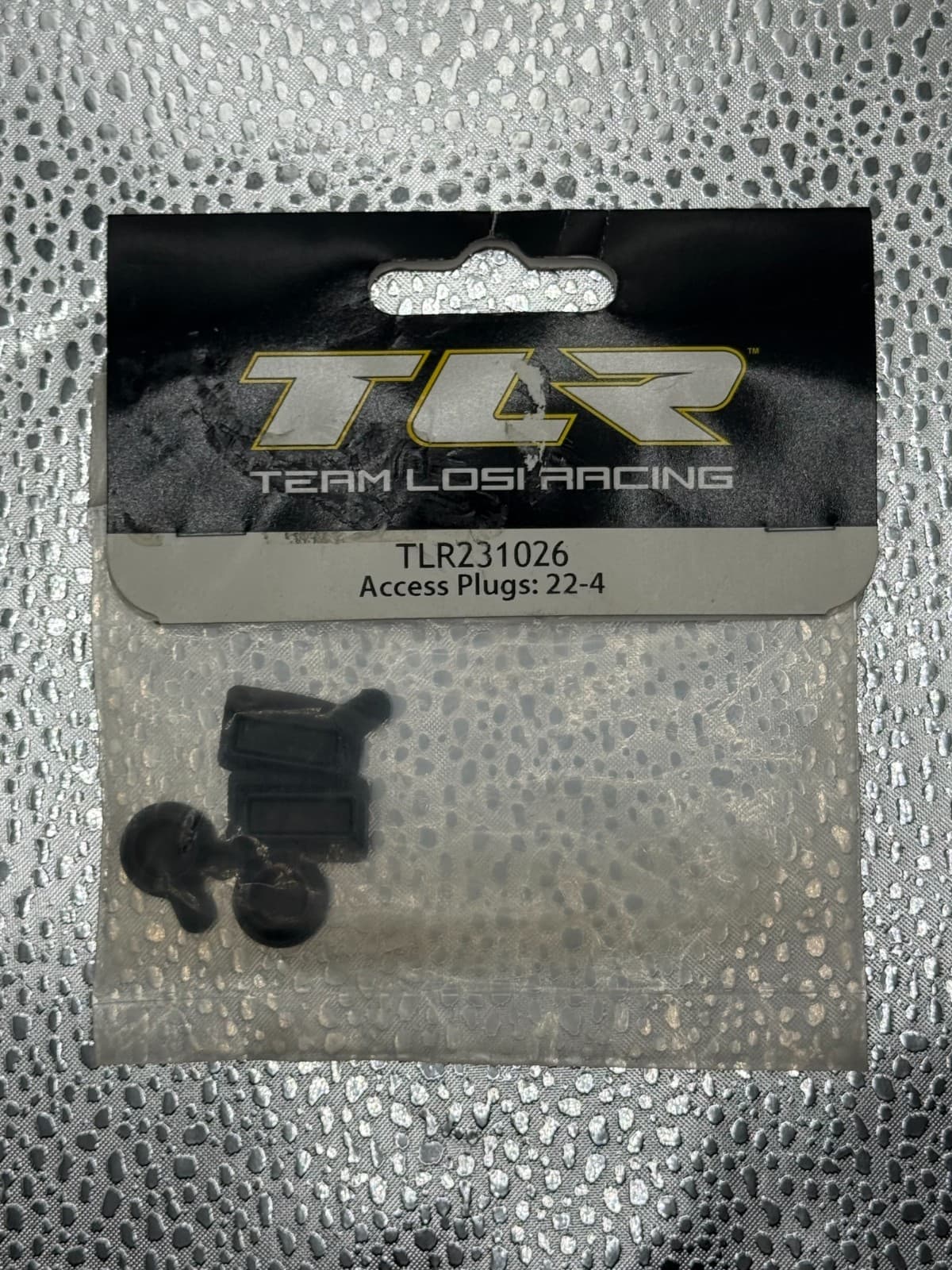 TLR231026 Access Plugs for TLR 22-4 – Team Losi Racing – New OEM Part - Image 1