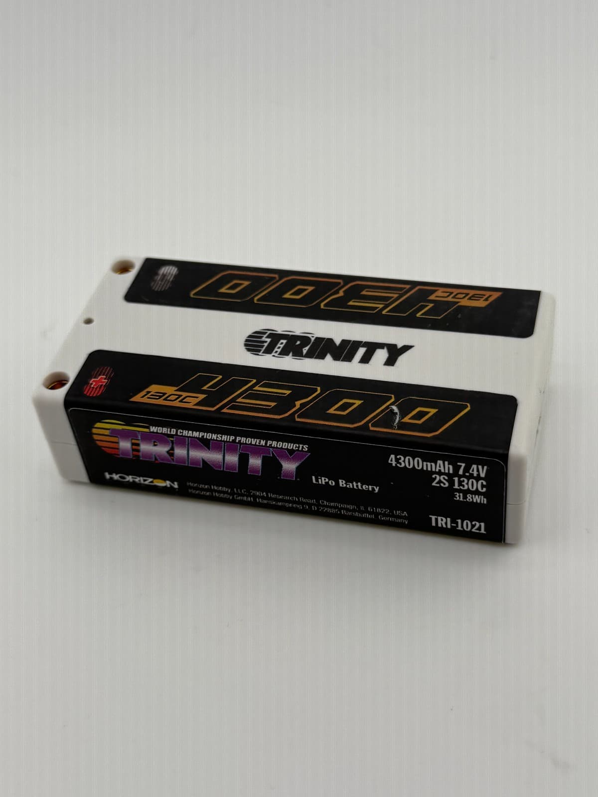 Trinity White Carbon 2S 7.4v 4300mAh 130c Shorty LiPo TEP2322 TRI-1021 - Image 1