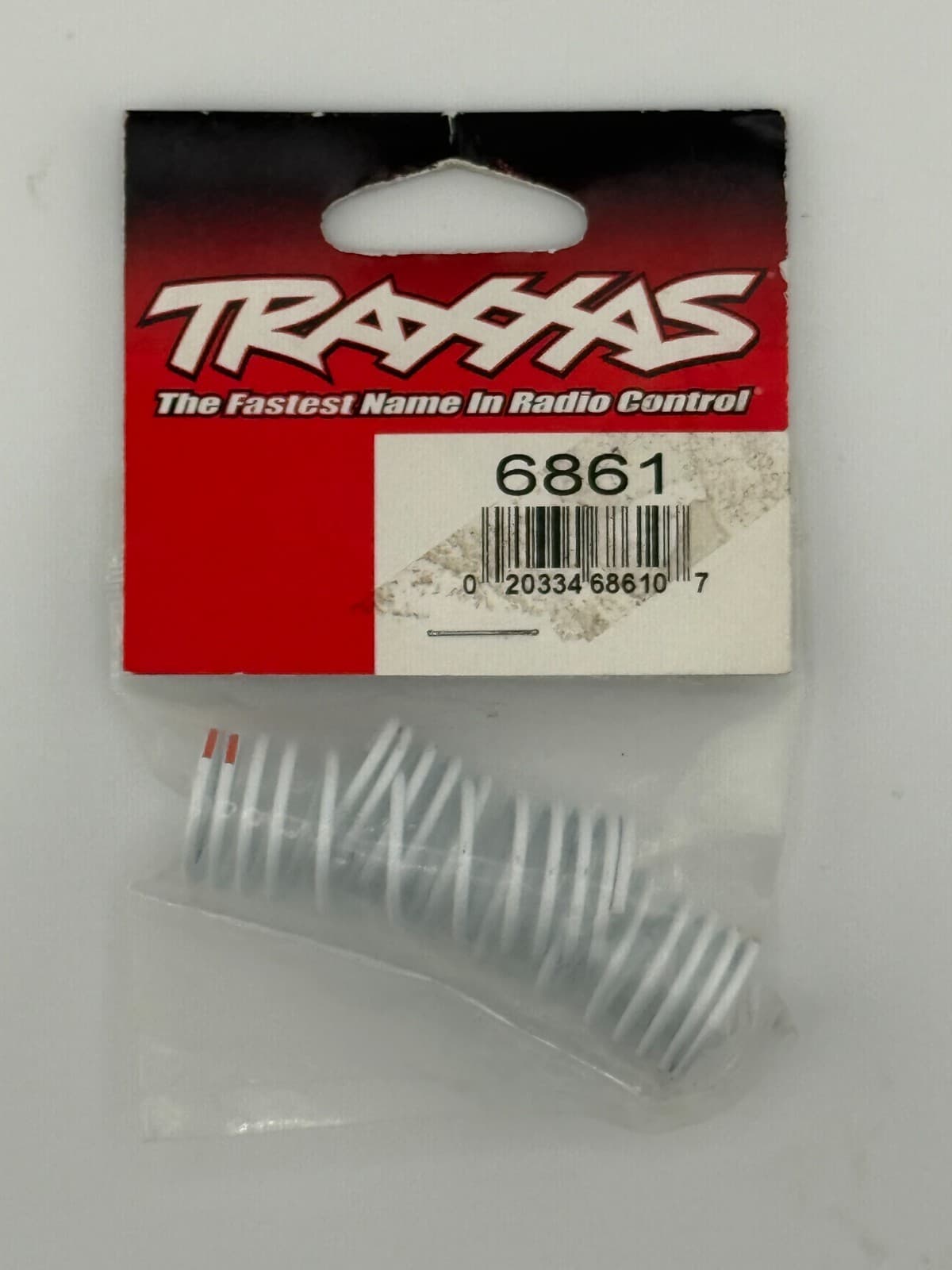 Traxxas 6861 - 2 Front Springs White Inn Color -20% Rate (Orange) - Image 1
