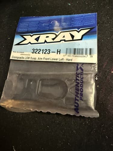 XRAY 322123-H - Front Left Lower Composite Disengaged Suspension Arm, Hard - Image 1