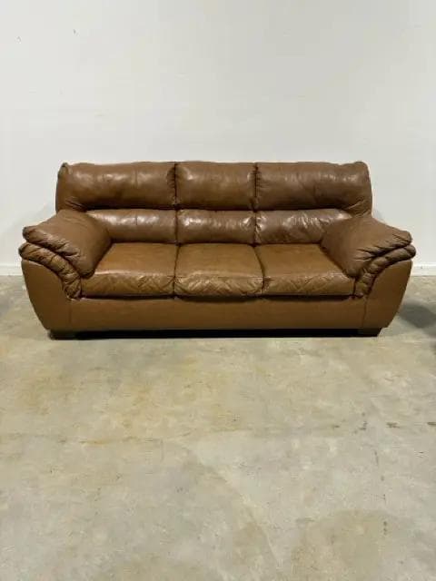 Ashley Whitlock Caramel 3-Cushion Sofa - Image 1