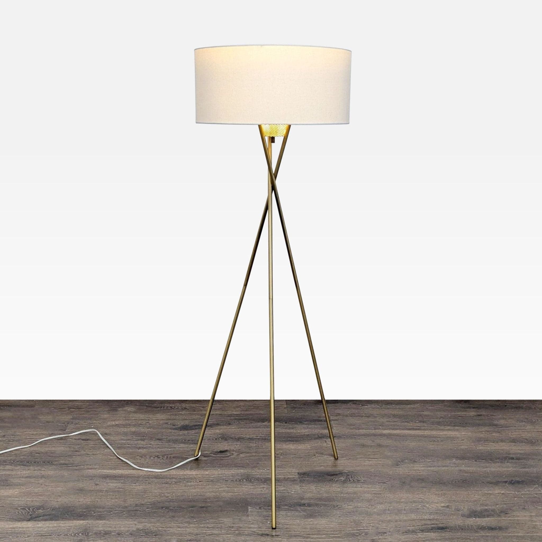 Modern Brass Tripod Floor Lamp with White Drum Shade - Image 1