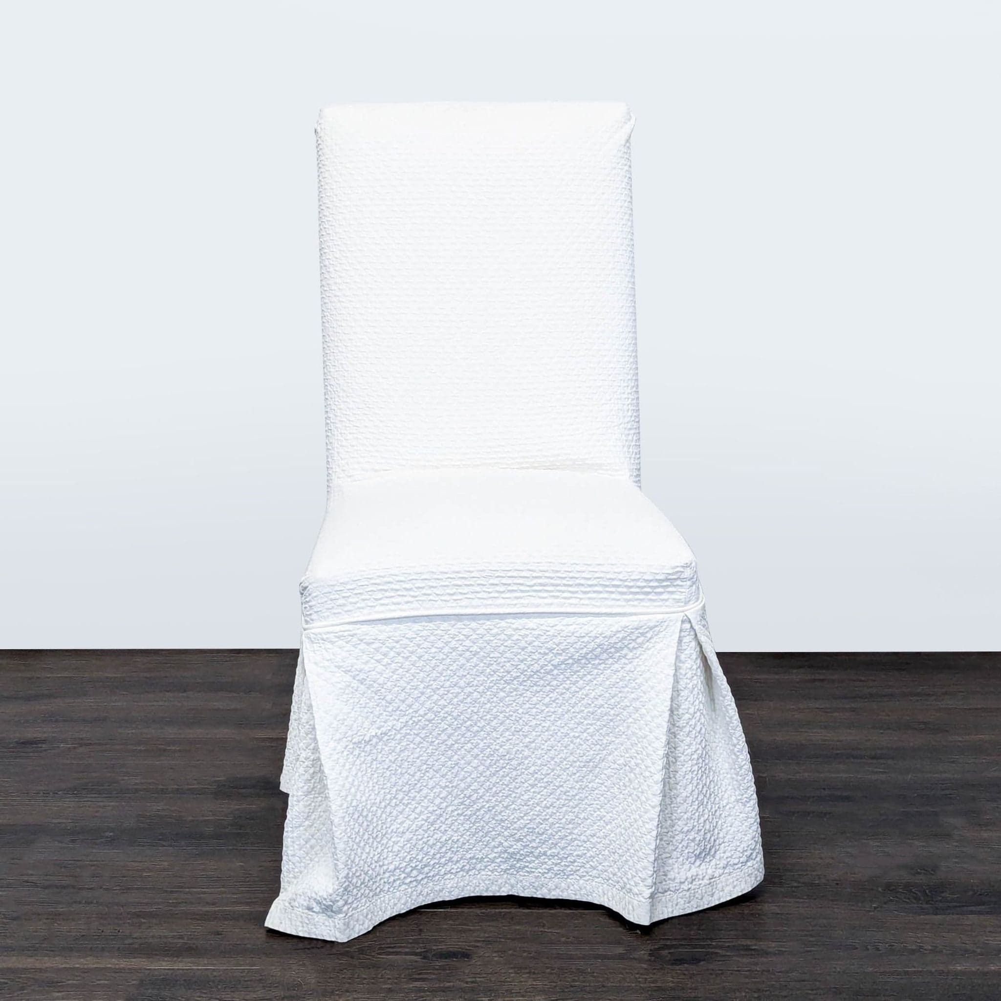 Pottery Barn Slipcovered Parsons Dining Chair on Wheels - Image 1