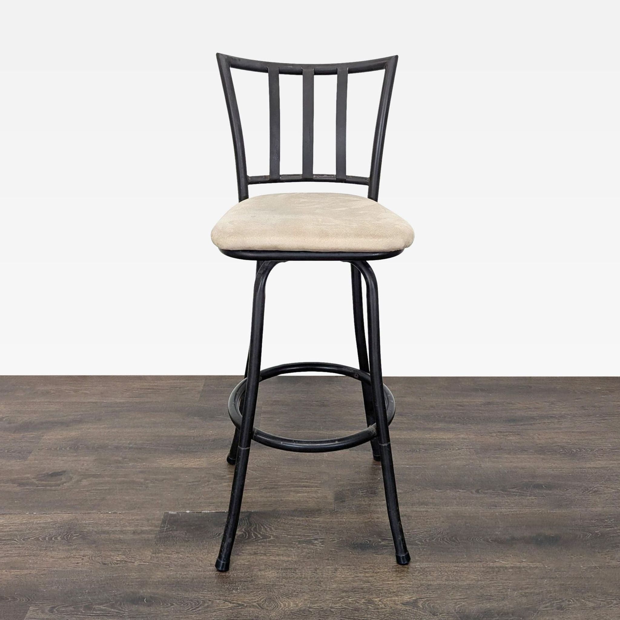 Metal Bar Stool with Cushioned Beige Seat and Black Frame - Image 1