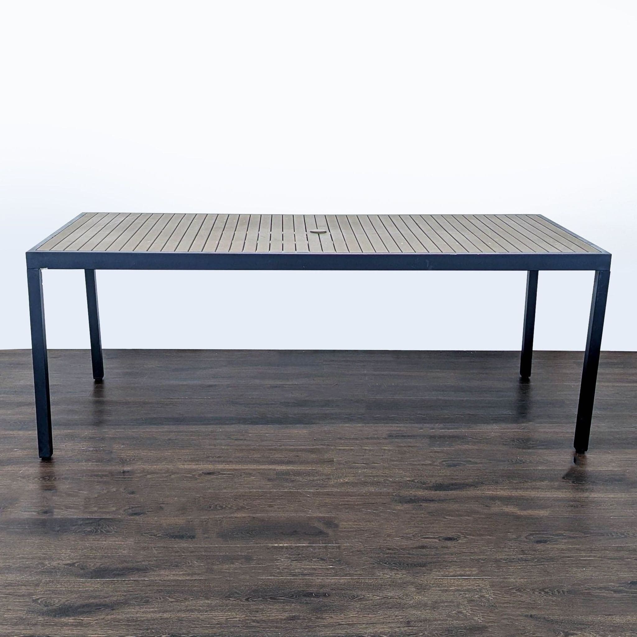 Crate & Barrel Alfresco Modern Outdoor Dining Table with Slatted Top - Image 1