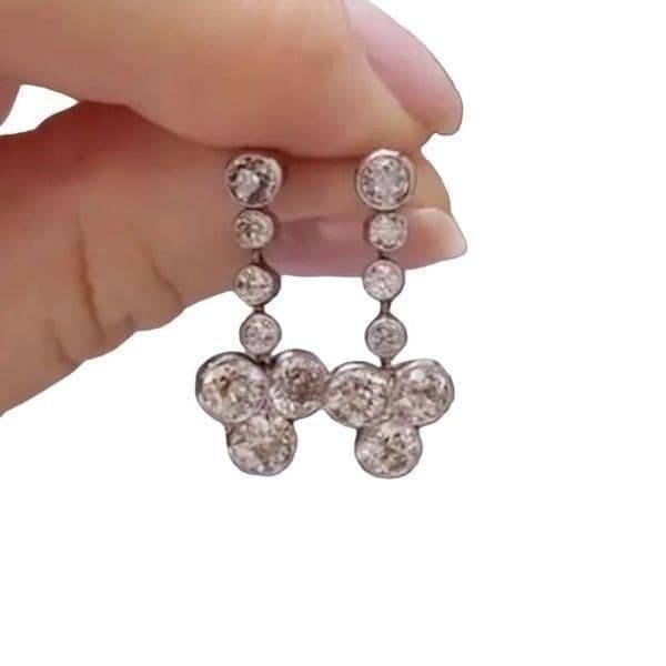 The Reverse T Dangle Drop Statement earrings in silver and cubic zirconia - Image 1