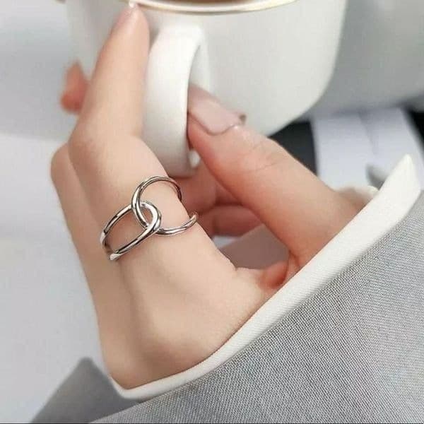 The Loop Ring in 925 silver adjustable sizing. - Image 1