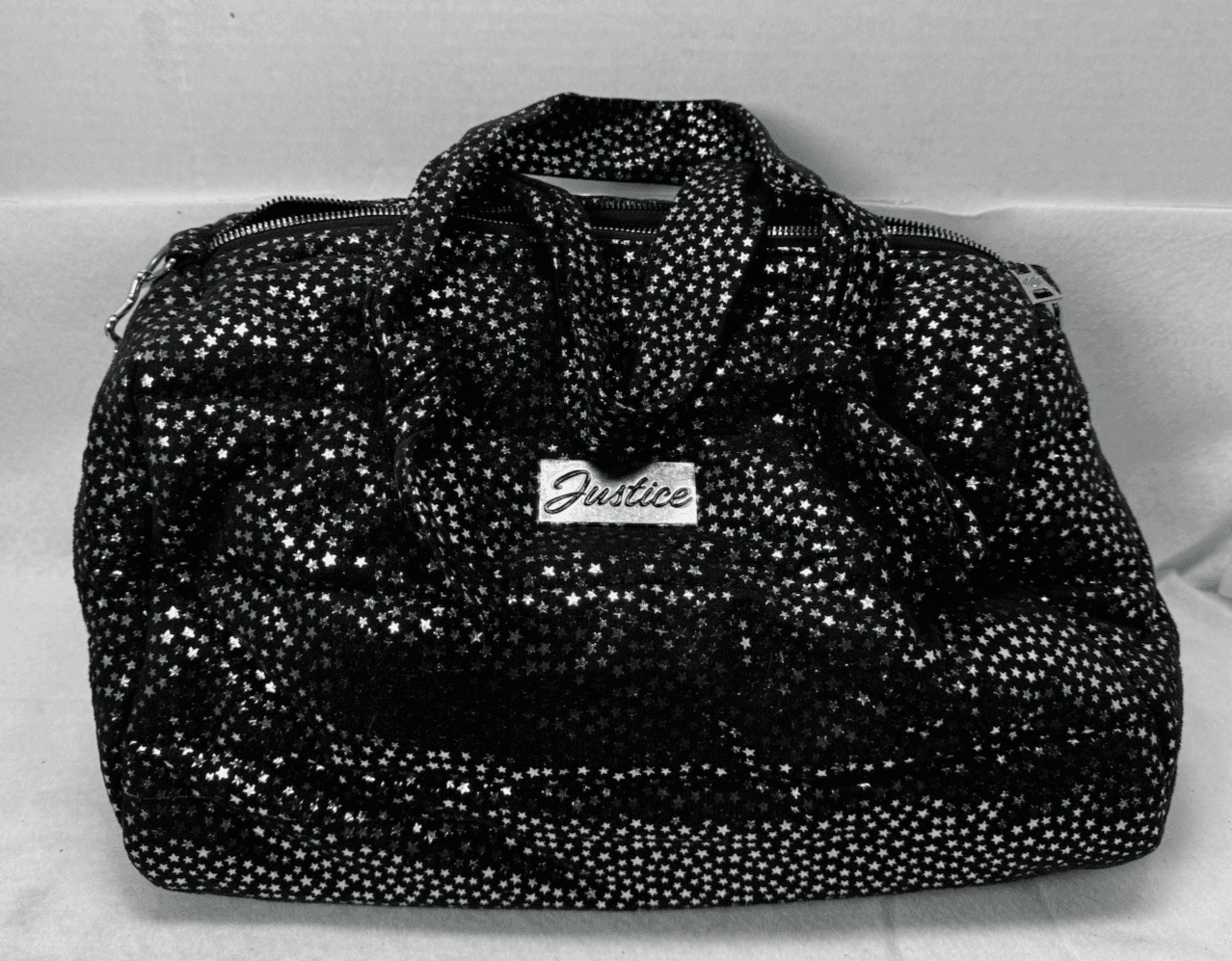 Justice Girls BLACK &Silver Star Print Quilted Duffle Bag - Image 1