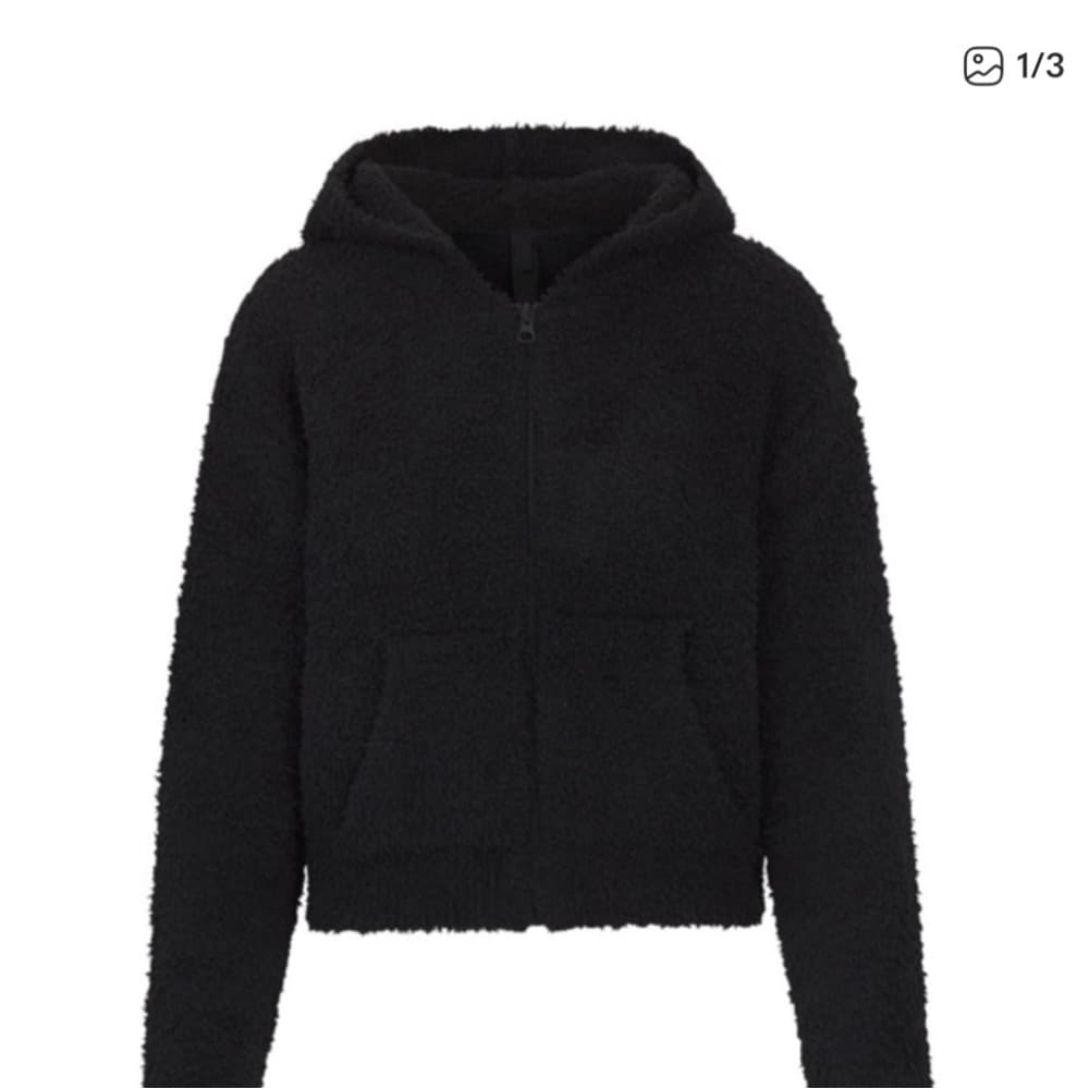 SKIMS Black Sherpa Zip-Up Hoodie - Image 1
