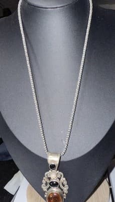 Sterling BA Suarti Amber, onyx, moon stone pendant With 22 In. Ss Necklace