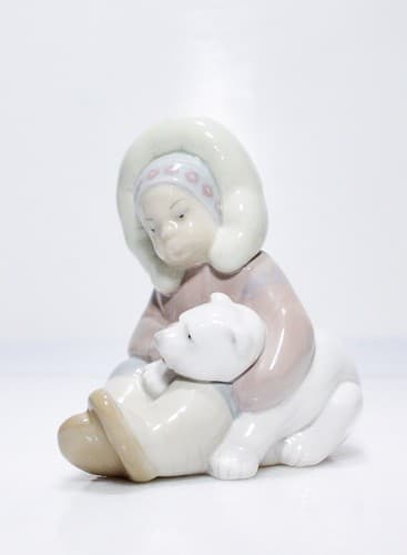 Retired LLADRO Spain Eskimo Boy with Polar Bear Cub Porcelain Figurine #1195 - Image 1