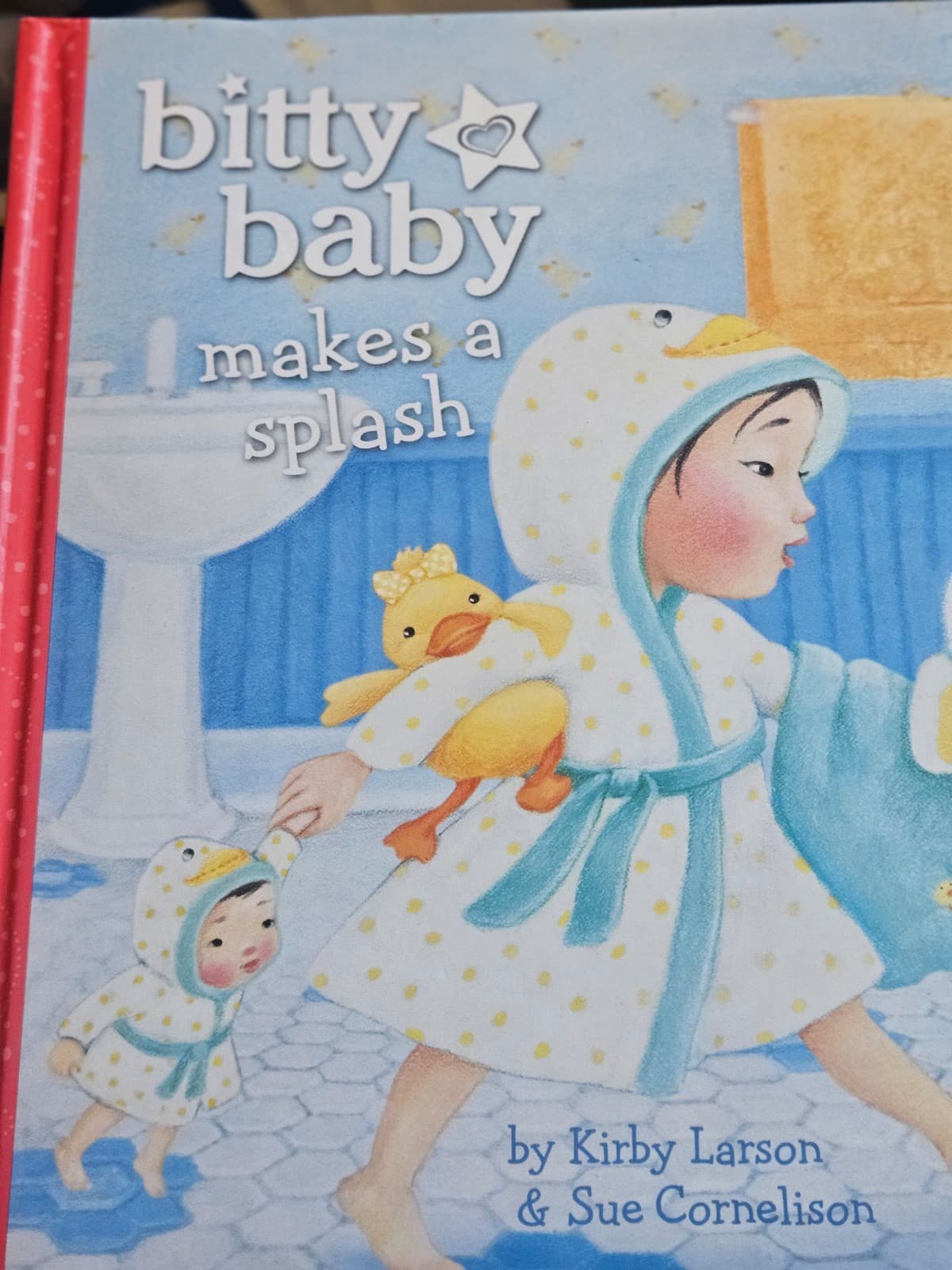 Amerucan girl. Bitty baby makes a splash. Hardcover. Buy 3 book listings, get 1 - Image 1