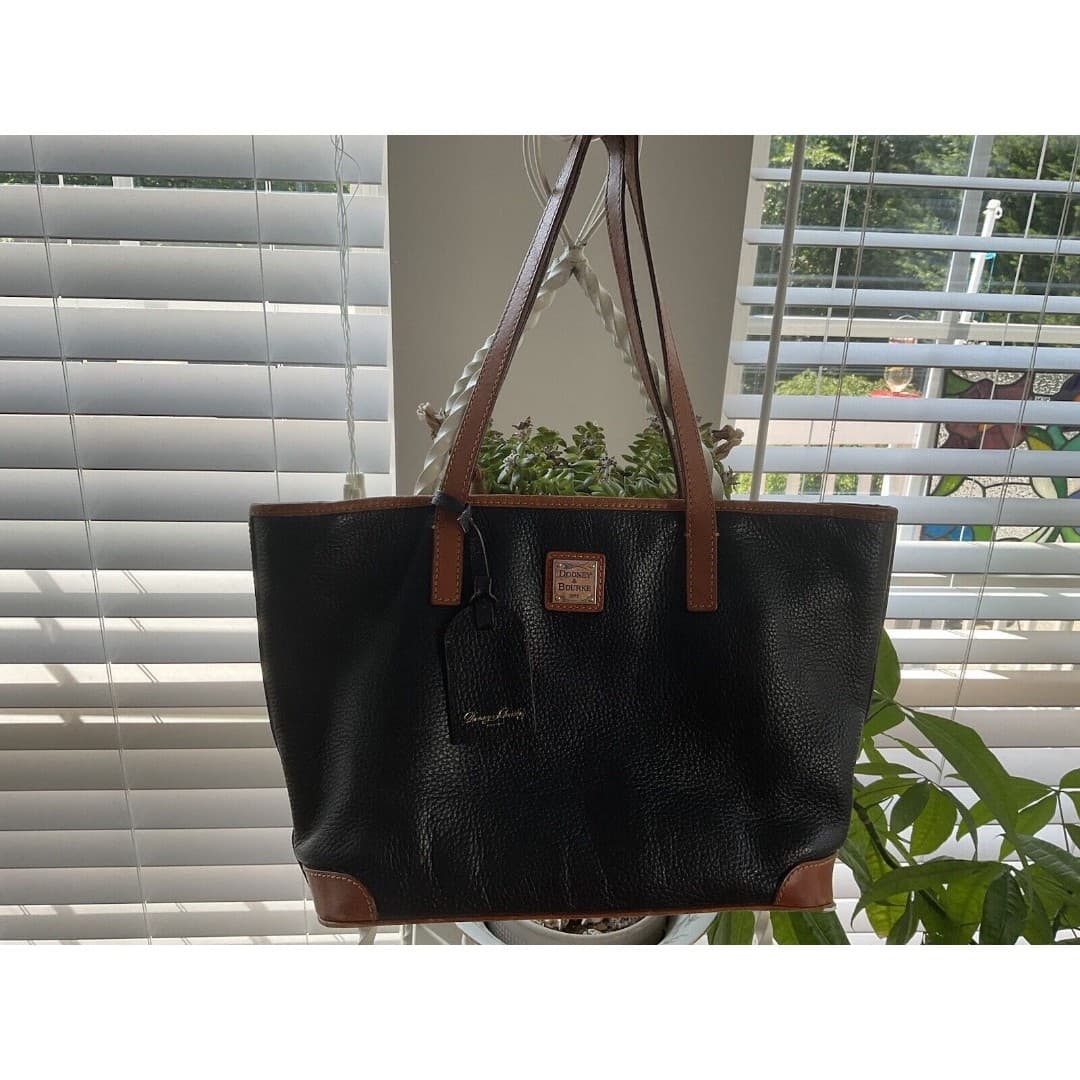 Dooney & Bourke Pebble Grain Charleston Tote Black and Brown, Pre owned.