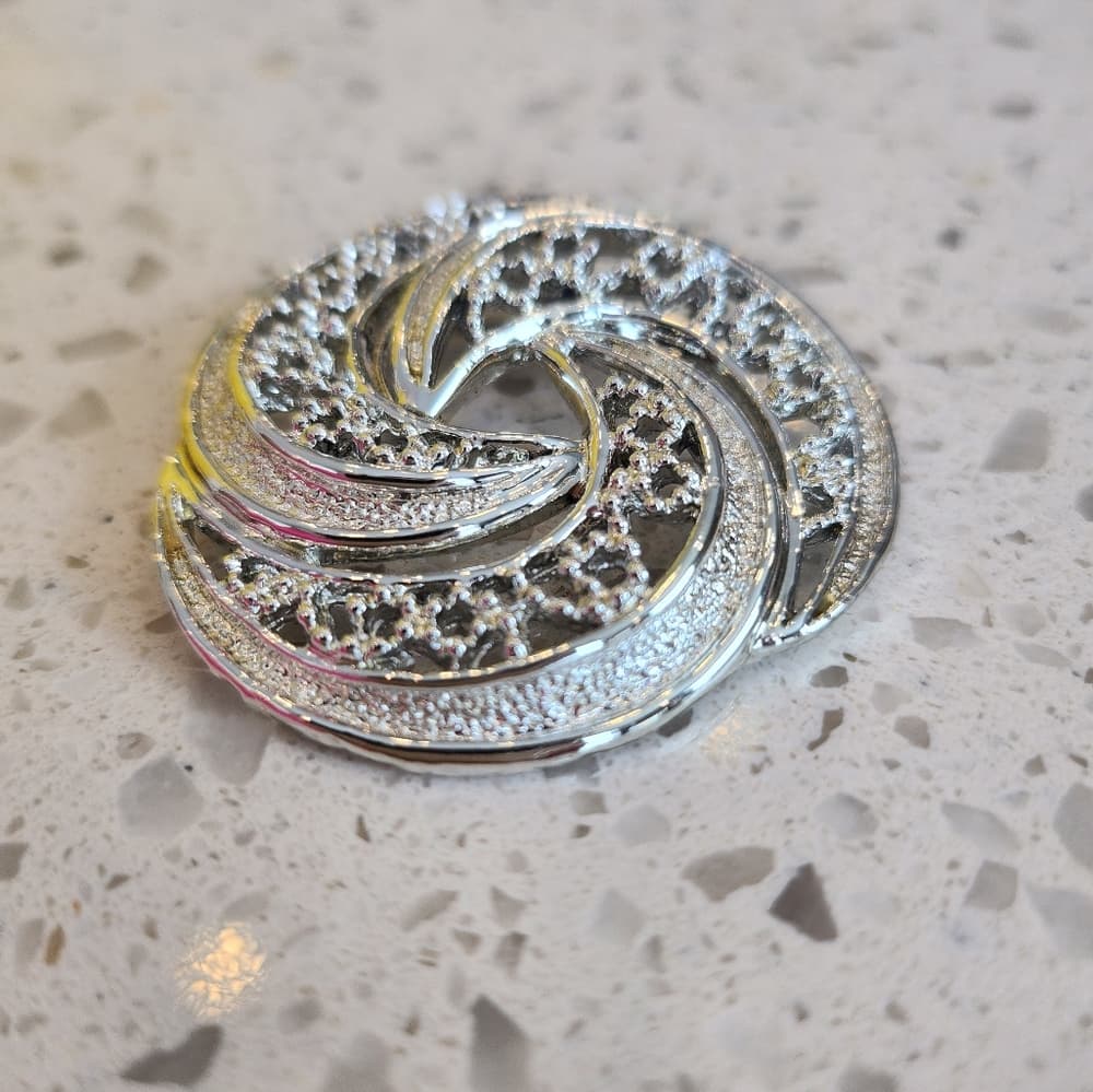 Vintage Gerrys Silver Tone Round Swirl Brooch