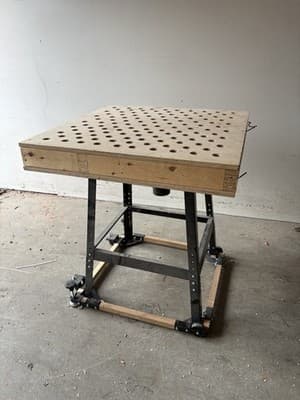 Custom wood working bench with tube for vacuum