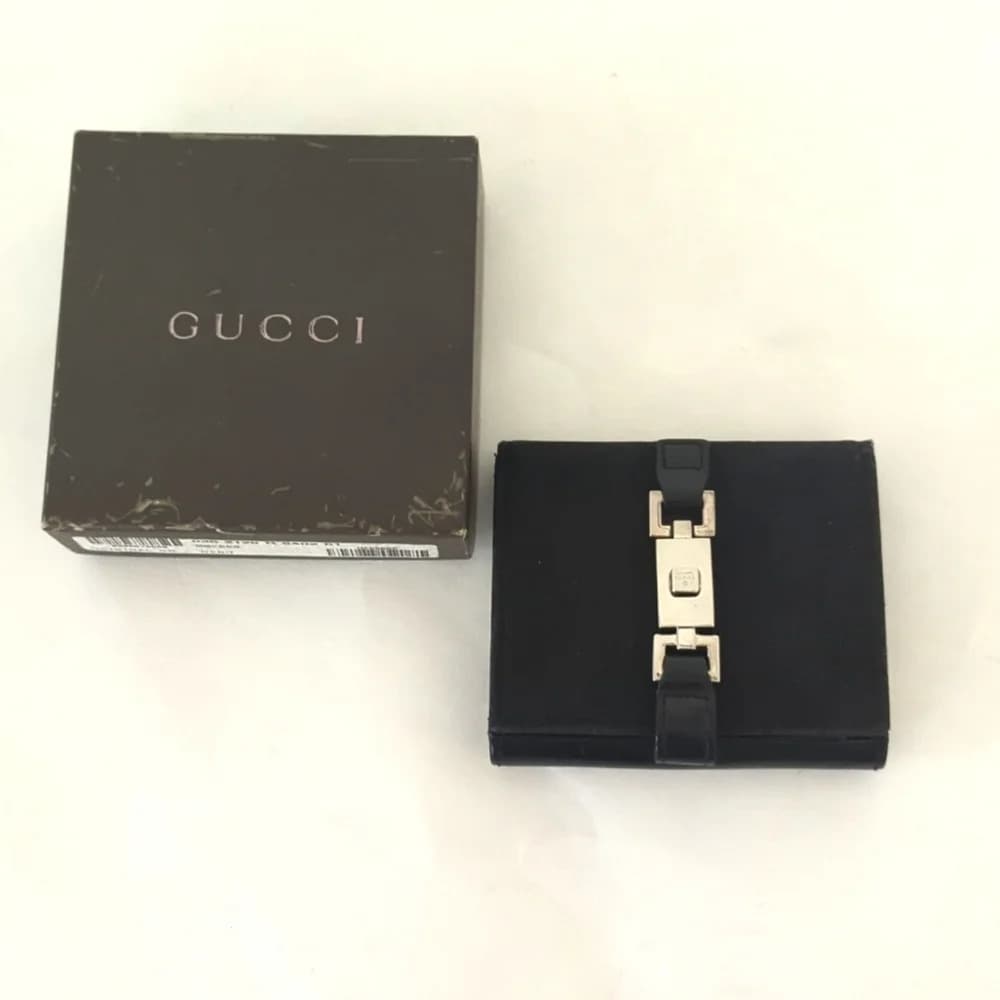 Gucci monogram logo silver lock wallet