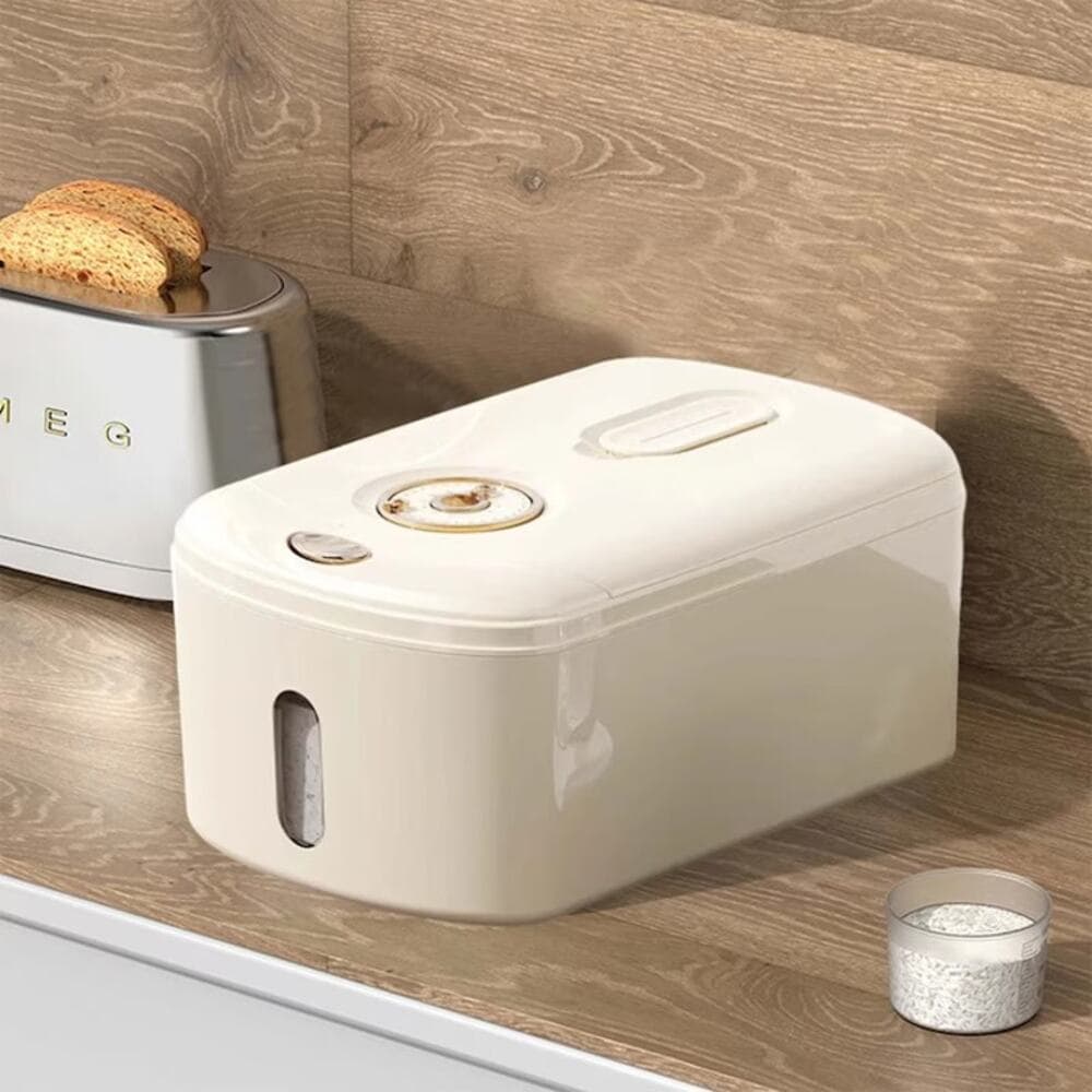 modern, rice storage dispenser with gold accents.