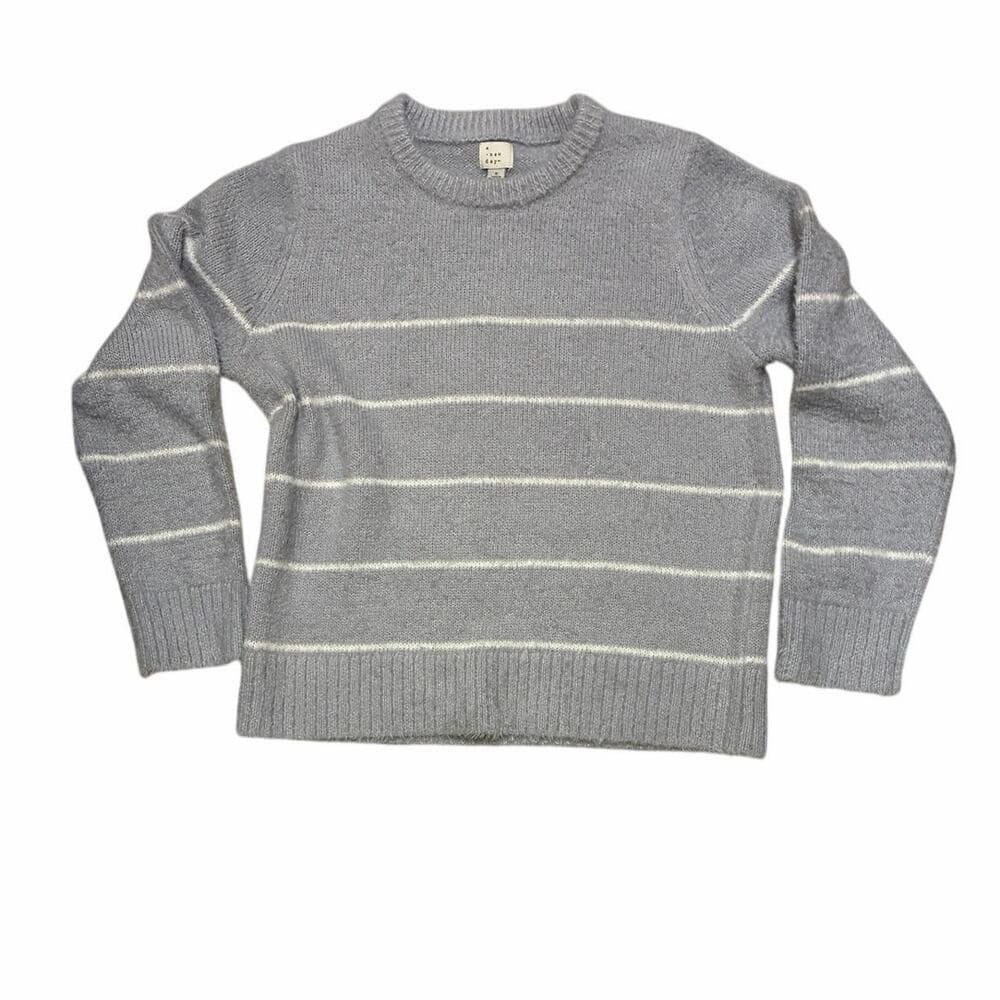 A New Day Women’s Long Sleeve Fuzzy Pullover Sweater With White Stripes On It