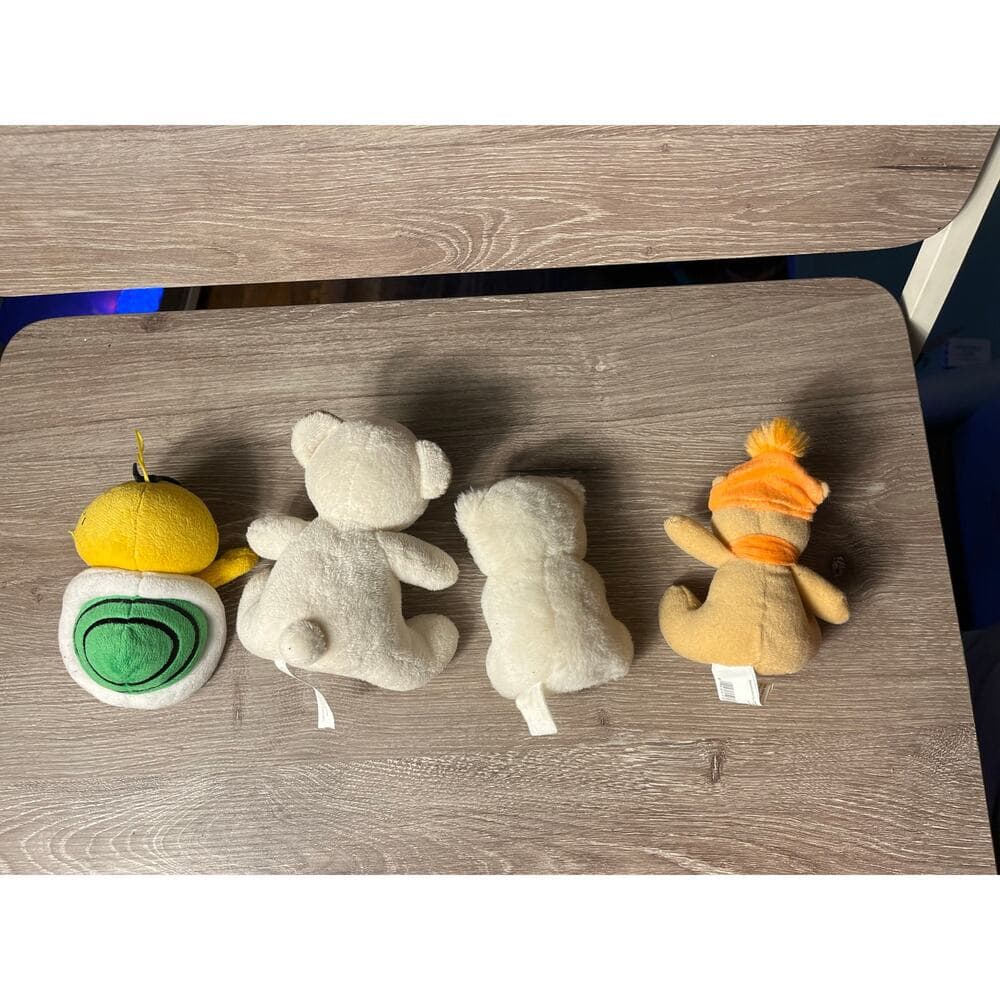 A bundle of four stuffed animals 4 inches