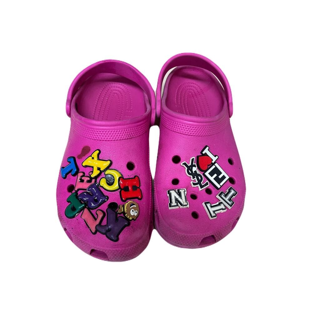 Crocs Pink Women’s Size 10 A stain on the right one