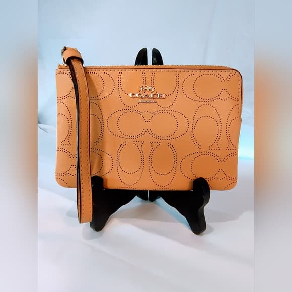NWOT COACH Perforated Leather Corner Zip Wristlet in Honey/Tan Color