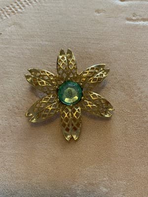 Vintage 1970’s Goldtone Metal Filigree Flower With Blue Crystal Brooch NOS