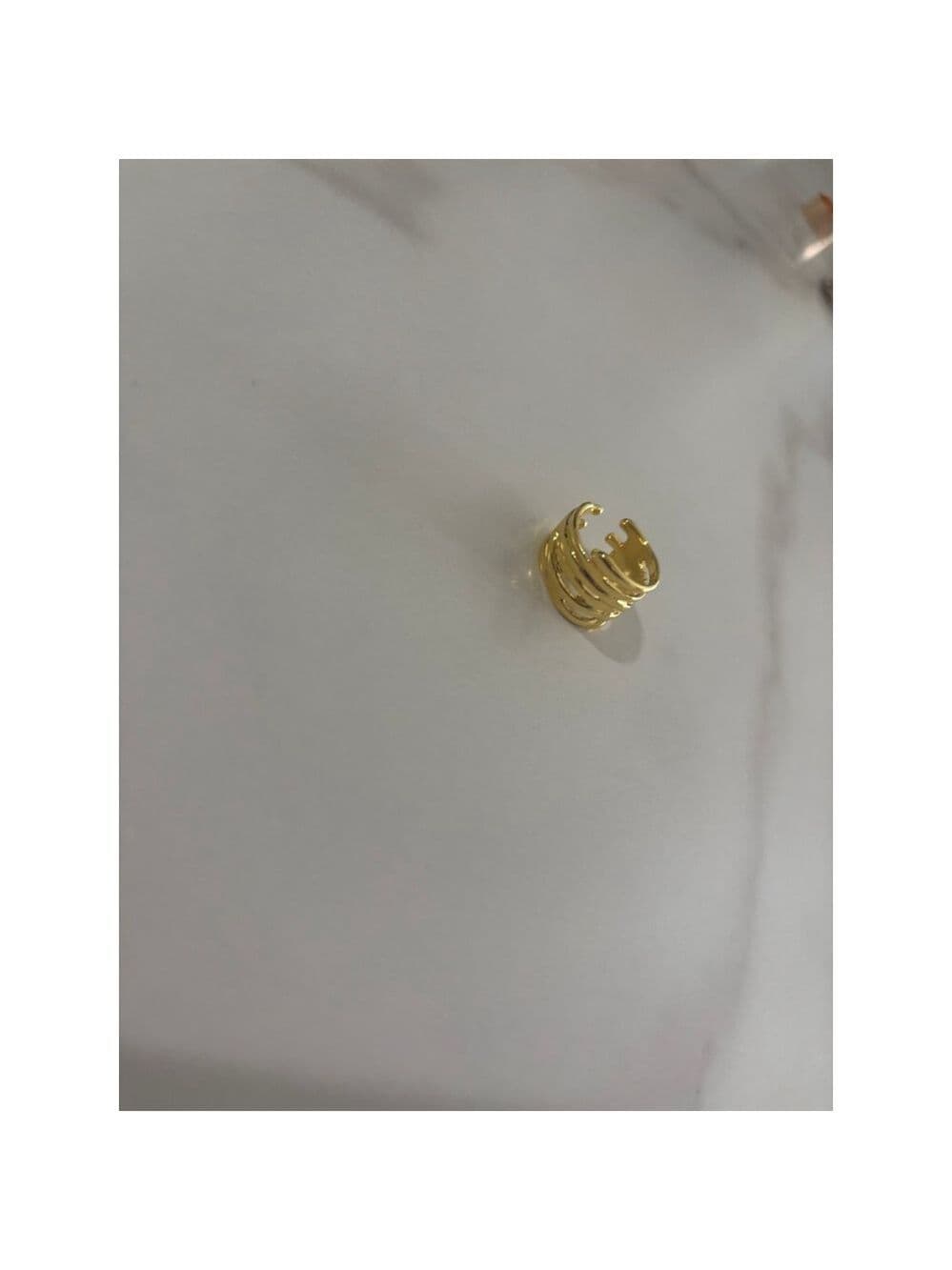 Gold toned ring