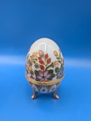 COLORFUL THREE LEGGED FLORAL MILK GLASS EGG WITH GOLD LEGS AND TRIM 3.75". G 11