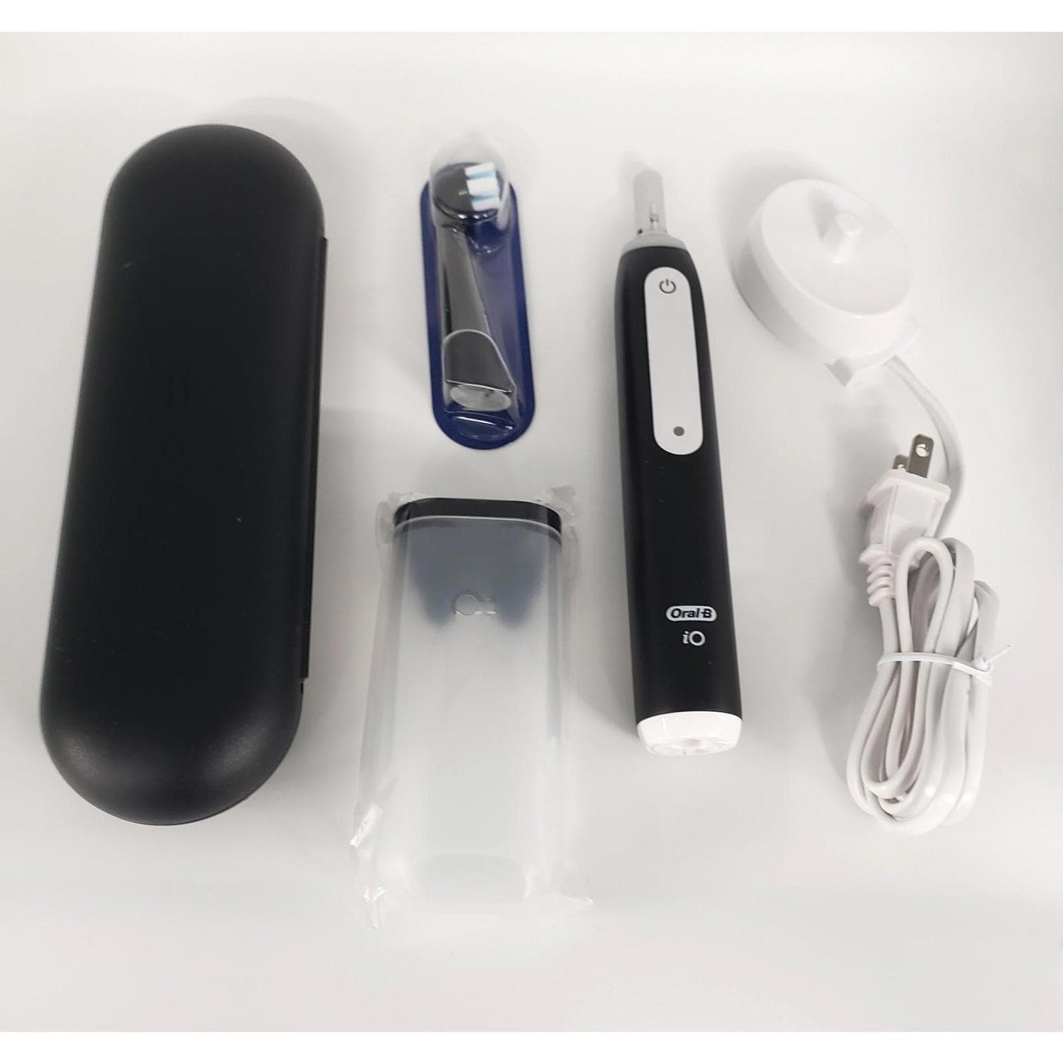 **Used - Oral-B iO Series 3 Electric Toothbrush, Black (one brush head, no box)