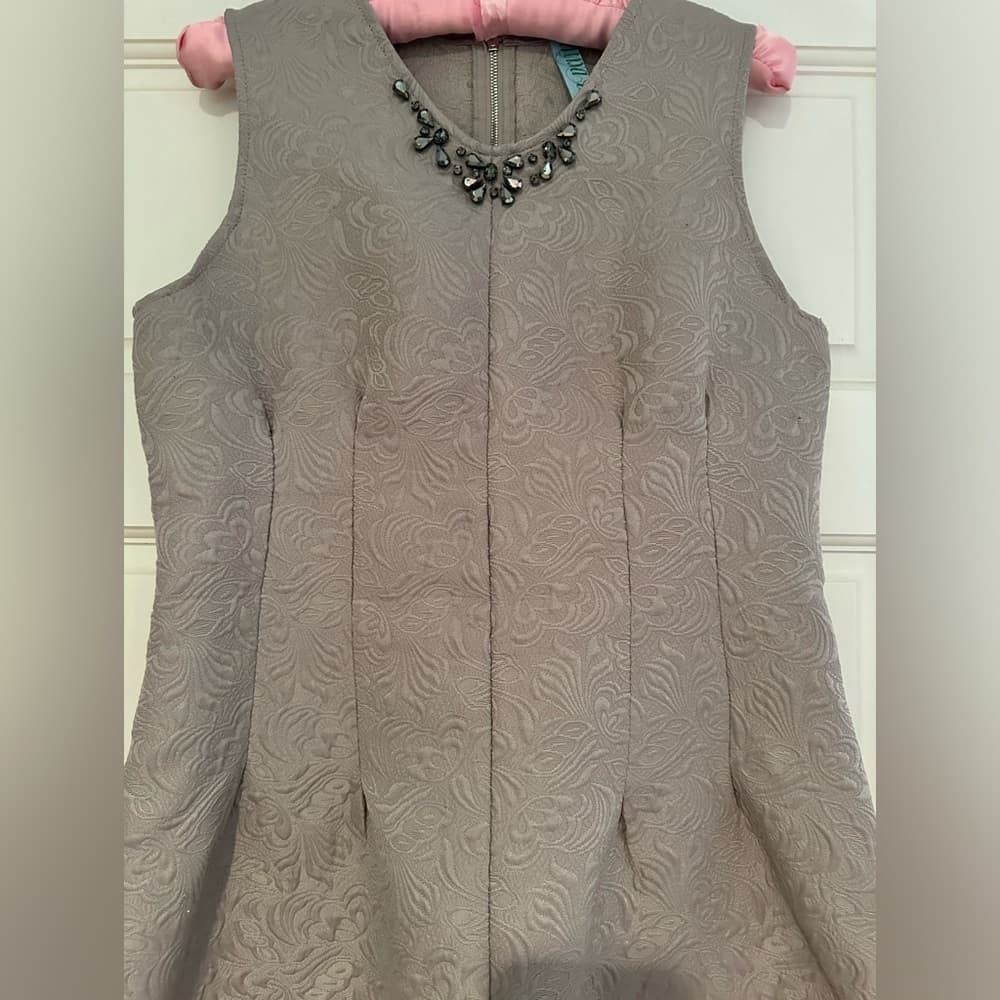 Elegant Textured Sleeveless Dress with Necklace Detail